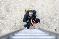 Belarus, Gomel, 04/06/2017, extinguishing forest fire.Belarus.Fireman will climb up the stairs.Work firefighter. Extinguish the fi Royalty Free Stock Photo