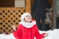 Russian holiday seeing off winter Maslenitsa.The girl enjoys the first snow