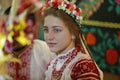 Woman in Belarusian clothes