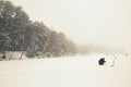 Belarus, Grodno, Molochnoe Lake. Winter fishing. fishermen on ice. Royalty Free Stock Photo