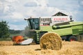 Belarus. Minsk - August 2020. Traktor with a baler or called hay baler on a field Royalty Free Stock Photo
