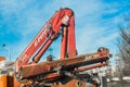 Belarus, Minsk - December 19, 2019: Machine crane on a background of blue sky and city