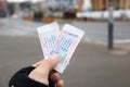 Belarus, Minsk - 04 january, 2023: Two Tickets in hand