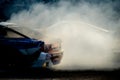 BELARUS. MINSK - JULY 2016: Two drift cars in puffs of smoke at the Belarus Drift Championship.