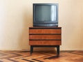 Belarus, Minsk - June 03, 2019Vintage Television on wooden antique closet, old design in a home. Sony trinitron kv-21m3