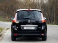Belarus, Minsk-October 6, 2019:Black car Renault Grand Scenic stands on the road,back view. Photographing a modern car in the park