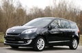 Belarus, Minsk-October 6, 2019:Black car Renault Grand Scenic stands on the road,side view. Photographing a modern car in the park