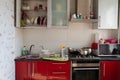 Belarus Minsk 06 12 2019 Typical small kitchen with dirty dishes and clutter full shot