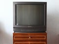 Belarus, Minsk - 04.05.2020:Vintage Television on wooden antique closet, old design in a home. Sony trinitron kv-21m3