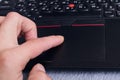 BELARUS NOVOPOLOTSK - 26 JANUARY 2021: Hand and black lenovo laptop