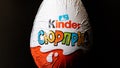 BELARUS, NOVOPOLOTSK - SEPTEMBER 29, 2020: Chocolate egg kinder surprise on black background