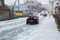 BELARUS, POSTAVY - OCTOBER 10, 2019: Snowy road and cars Royalty Free Stock Photo