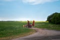 Belarus. The tractor removes in the fields of Belarus. May 23, 2017