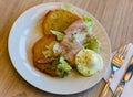 Belarusian draniki with ham, fried egg