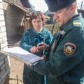 Belarusian firefighters inspect private homes for fire safety In the Gomel region.