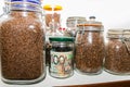 Belarusian paper money in a glass jar among other jars with cereals and dried fruits. Keeping money in a glass jar. Royalty Free Stock Photo