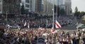 MINSK, BELARUS - AUGUST 16, 2020: Peaceful Protesters With Posters And Flags Move Along Street City. Belarusians Took