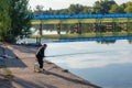 Belaya Tserkov, Ukraine, August 24, 2020: Elderly man fishing on the bank of the river Royalty Free Stock Photo