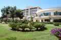 View of the green lawn and moden building in the high class hotel.