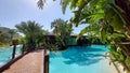 Belek, Turkey - May 2021: Hut on a tropical island. Cottage with pool in the jungle. Close-up. Tropical plants around the cottage Royalty Free Stock Photo