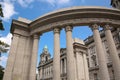 Belfast City Hall building with a classical Renaissance stone exterior and corner tower with columns. Belfast, Northern Ireland.
