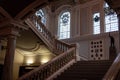 BELFAST, NORTHERN IRELAND, DECEMBER 19, 2018: Staircase of the interior of Belfast City Hall, showing a statue of a soldier