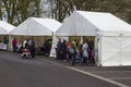 Belfast Northern Ireland. Small traders and customers in their marquees at the Belfast Spring Festival as trading gri