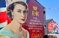 Belfast\'s Shankill Road with a giant sign to honour and remember the Queen