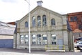 The former Harland and Wolff Headquarters and Drawing Offices, now The Titanic Hotel.