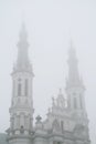 Belfries of the Church of the Holiest Saviour in Warsaw in mist Royalty Free Stock Photo