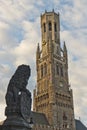 Belfry bell tower with lion statue in Bruges, Belgium Royalty Free Stock Photo