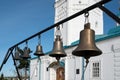 Belfry with bells on the background of the Transfiguration Cathedral. Royalty Free Stock Photo