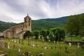 Belfry and church of Sant Feliu de Barruera and the graveyard, Catalonia, Spain. Romanesque style Royalty Free Stock Photo