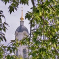 Belfry of Holy Dormition man`s monastery Sarovskaya Pustyn`. Autumn day landscape