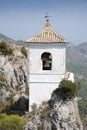 Belfry on the peak of the mountain. Royalty Free Stock Photo
