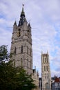 Belfry and saint Bavo`s cathedral in the background, Ghent, Flemish Region, Belgium