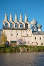 Belfry of the Tikhvin Uspensky monastery in the October evening. Tikhvin, Russia