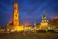 Belfry tower and Grote markt square in Bruges, Belgium on dusk in twilight