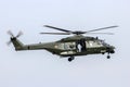 Belgian army NH90 helicopter in flight over Kleine-Brogel Air Base. Belgium - September 13, 2014