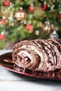 Belgian Chocolate Meringue Roulade filled with whipped cream and Royalty Free Stock Photo