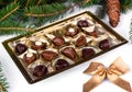 Belgian chocolate pralines with Christmas tree Royalty Free Stock Photo