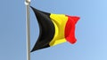 Belgian flag on flagpole. Belgium flag fluttering in the wind. 3D render. Royalty Free Stock Photo