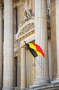 Belgian flag with neoclassical architecture