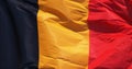 Belgian Flag Waving in the Wind against blue sky Royalty Free Stock Photo