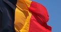 Belgian Flag Waving in the Wind against blue sky Royalty Free Stock Photo