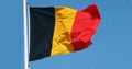 Belgian Flag Waving in the Wind against blue sky Royalty Free Stock Photo