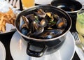 Steamed mussels, french fries and beer Royalty Free Stock Photo