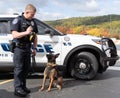 Policeman Demonstrates Training of Belgian Malinois Police Dog Royalty Free Stock Photo