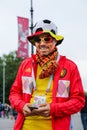 Belgian man supporter cheering and smiling.