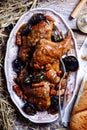 Belgian rabbit stew with ale and prune.style rustic Royalty Free Stock Photo
